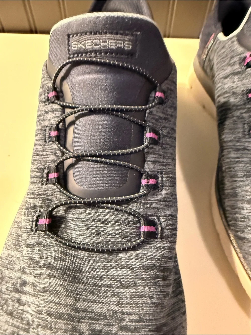 Skechers women’s slip navy -On Athletic Sneakers with Pink Accents